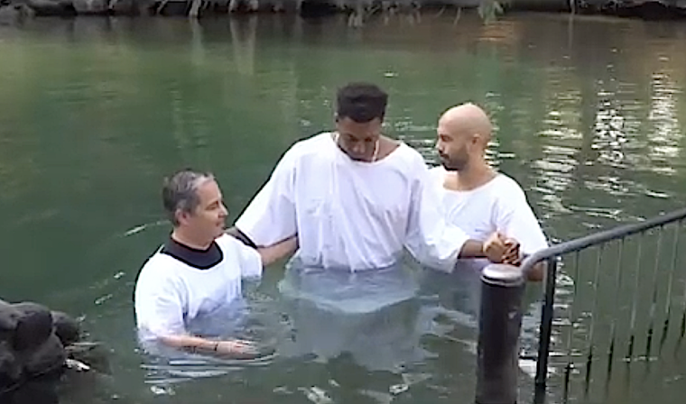 Lecrae gets baptized in the Jordan River; says he was immersed into Christ, not just the water