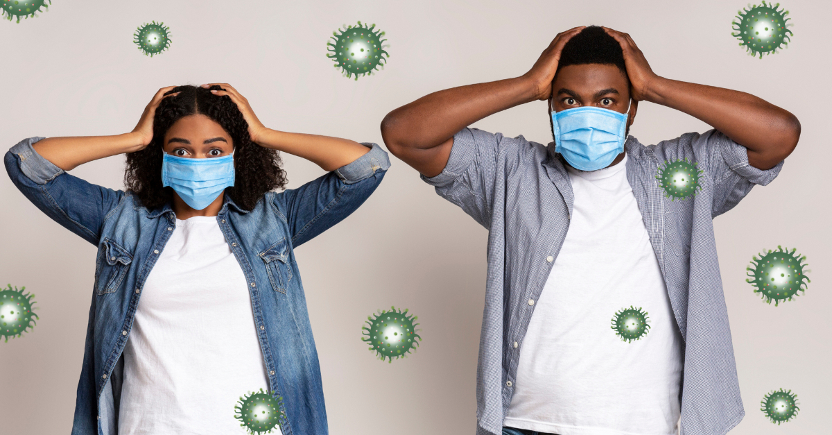 man and woman terrified hands on head face masks coronavirus vaccine mark of beast