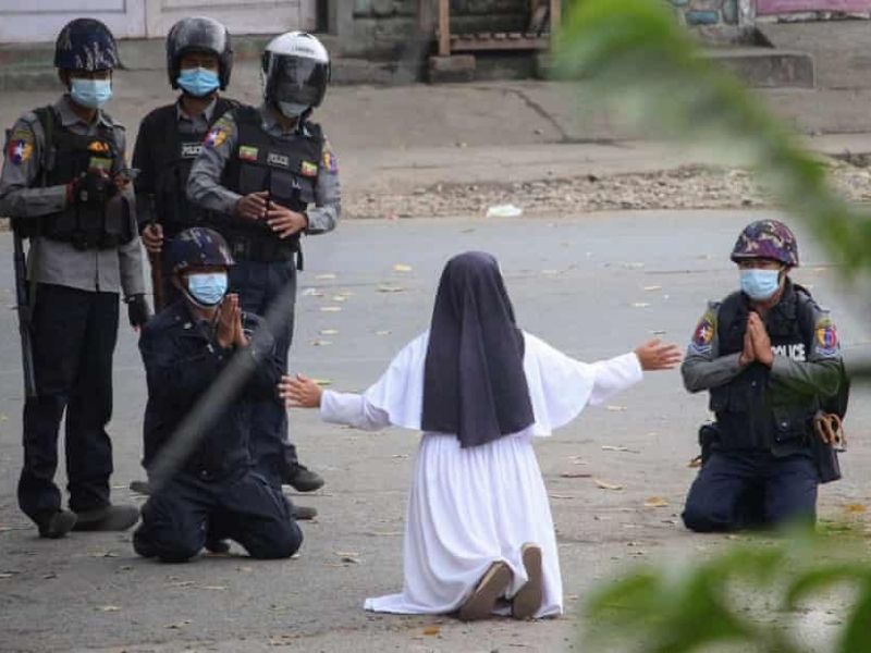 A Myanmar Nun Kneels Between The Police And Protestors Amid The Myanmar Chaos | God TV
