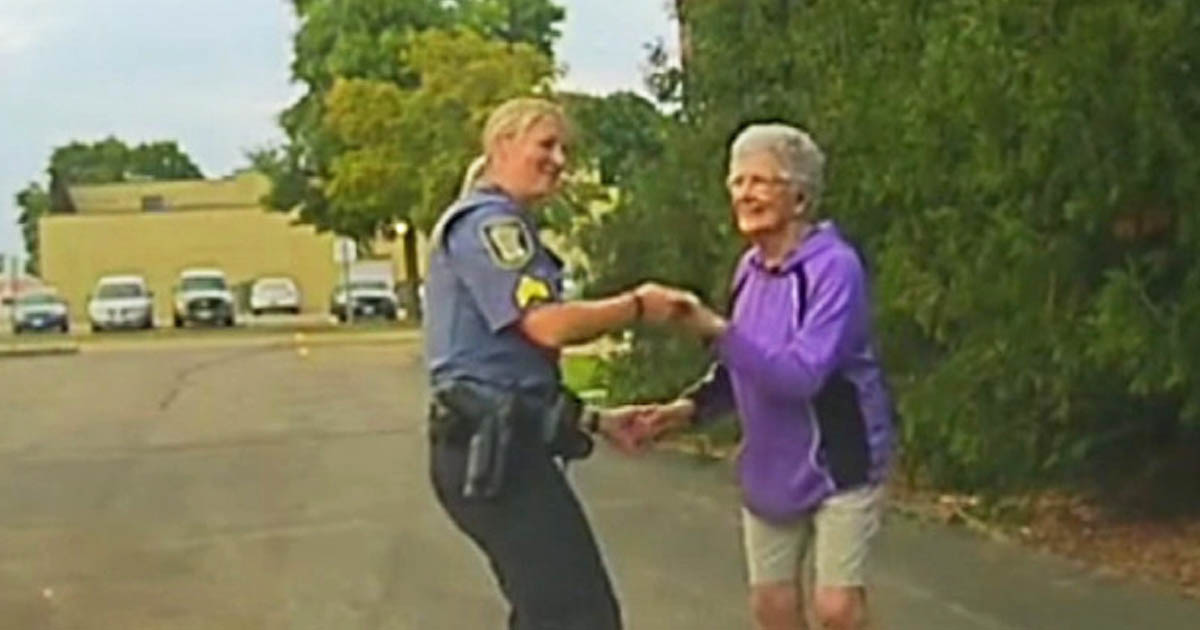 Police Officer Stops To Bust A Move With Senior Dancing Alone on the Street