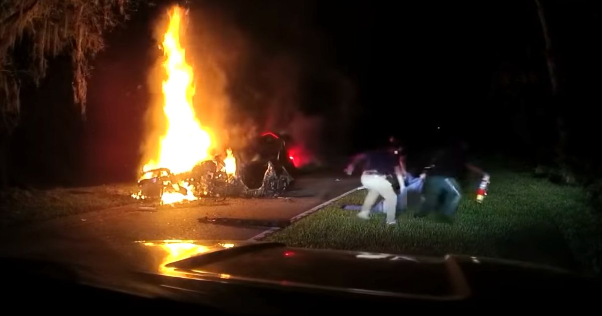 Hero Officers Save Man Trapped In Burning Car In Daring Rescue