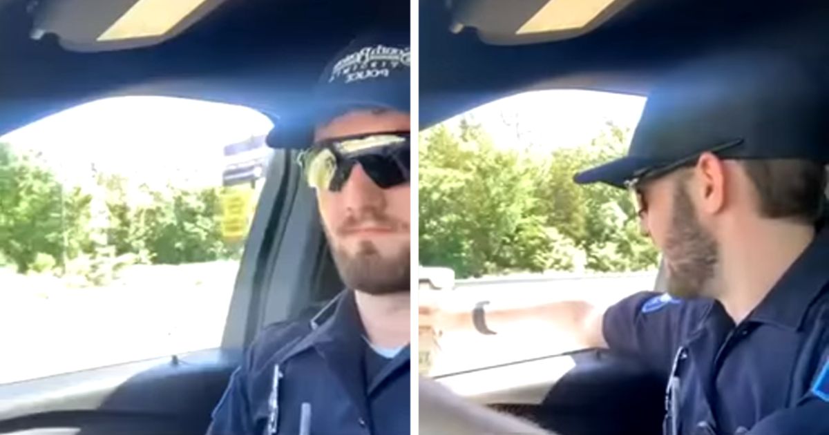 Police Officer Sees Hungry Man Holding Up Sign, Comes Back To Feed Him