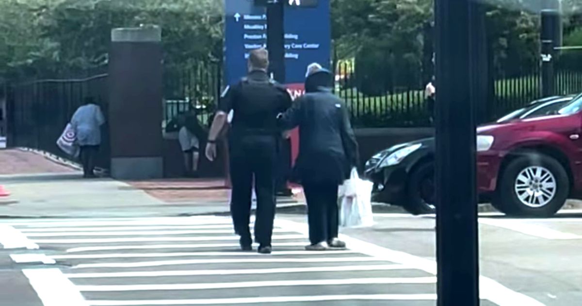Police Officers’ Act Of Kindness To Elderly Woman In Traffic Goes Viral