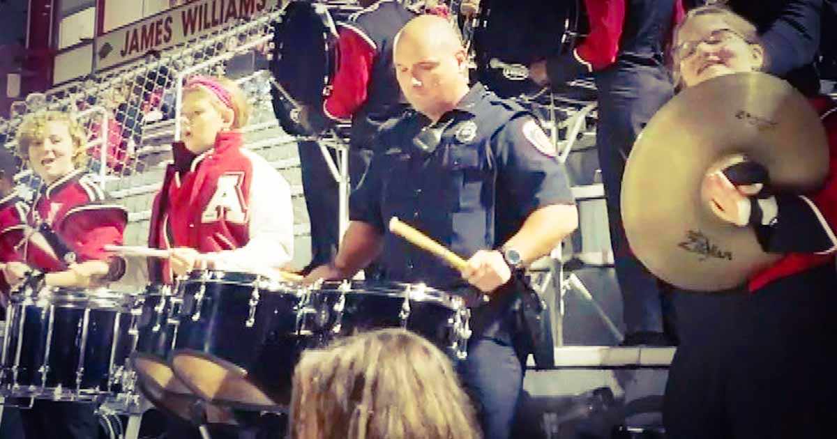 Police Officer Wows Crowd Playing Drums At High School Football Game